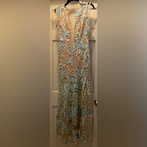 New without tag dress. Slit on one side size small custom dress.